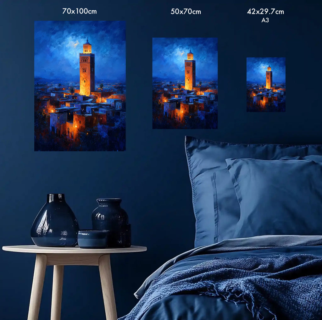 Visual size comparison guide for poster art, showing A3, 50x70 cm, and 70x100 cm sizes mounted on a dark blue wall above a bed, emphasizing a monochromatic bedroom aesthetic